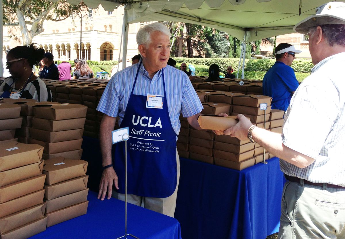 Chancellor Gene Block hands out sandwiches