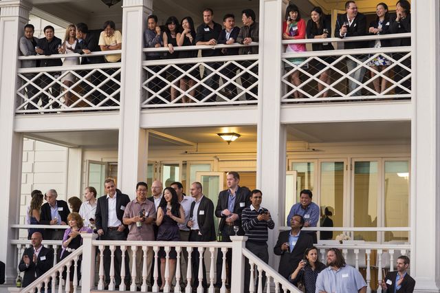 Students and alumni celebrate the program's 10th anniversary at the Annenberg Community Beach House.