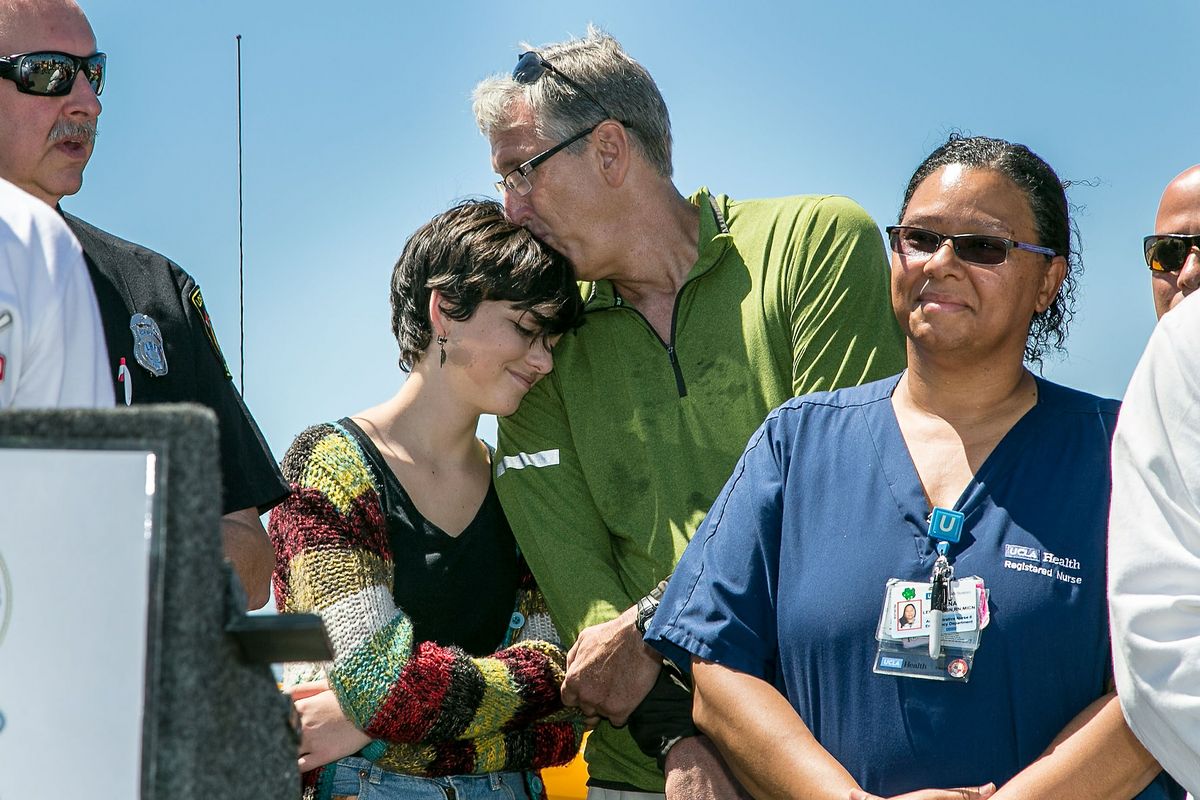 Robert Kilroy and his daughter, Emily, at a press conference attended  by nurse Jena Lewis of Reagan UCLA Medical Center