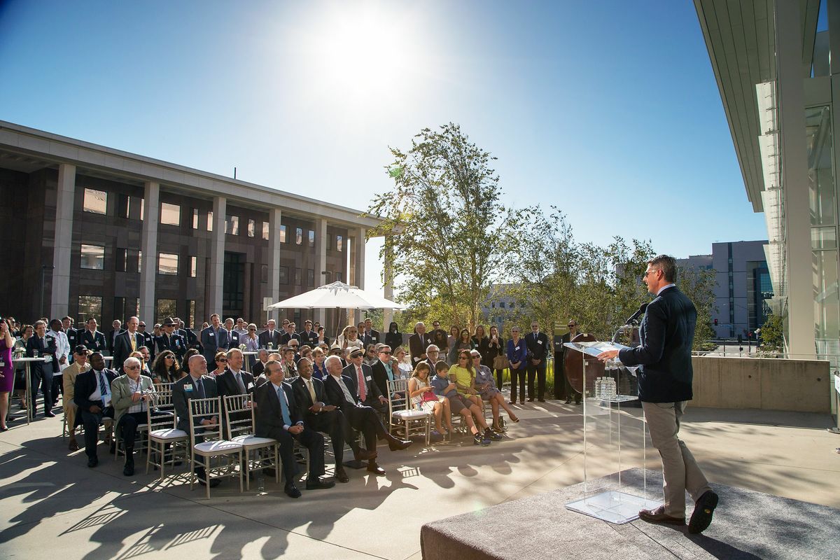 Casey Wasserman addresses guests at the opening ceremony for the Edie & Lew Wasserman Building