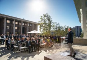 Casey Wasserman addresses guests at the opening ceremony for the Edie & Lew Wasserman Building