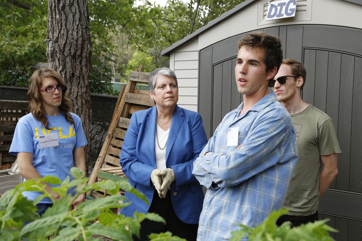 UC President Janet Napolitano and gardening students