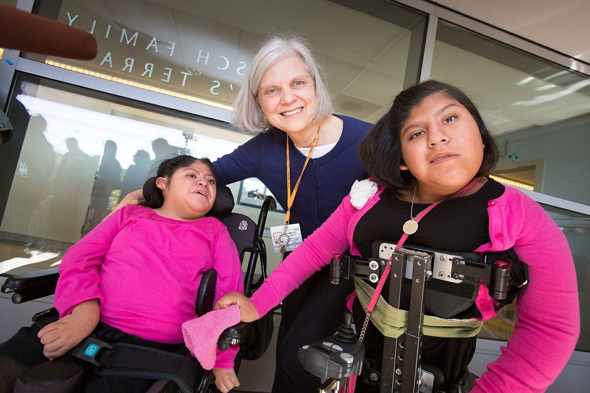 Dr. Barbara Van De Wiele and twins Josie and Teresita Alvarez