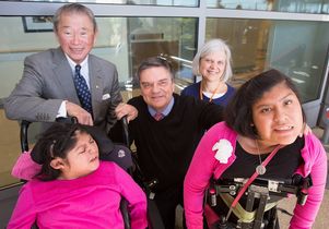 The twins and the leaders of their medical team