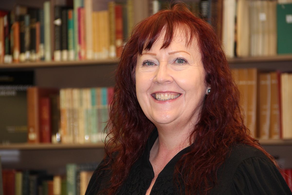 Archivist Maureen Russell