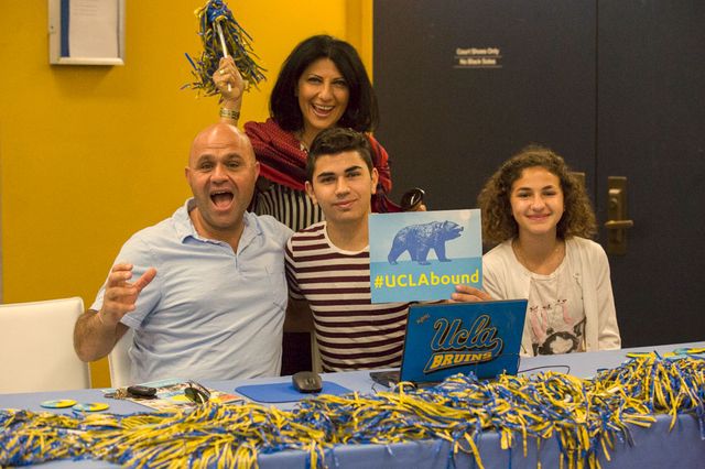 A family celebrates at UCLA Bruin Day 