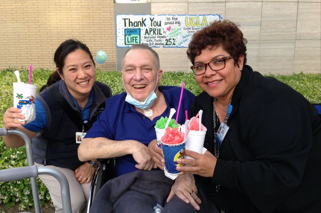 Jim Weingarten, flanked by Shirley Tse-Wachs and Martha Mansoor