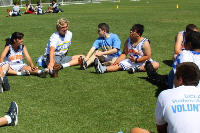 Bruin athletes stretch with Prime Time Games athletes