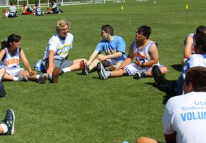 Bruin athletes stretch with Prime Time Games athletes