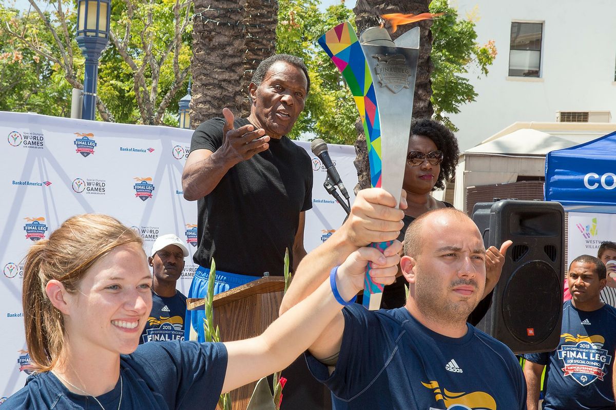 Rafer Johnson and Special Olympics torch