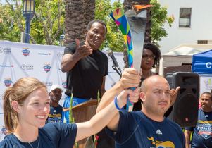 Rafer Johnson and Special Olympics torch