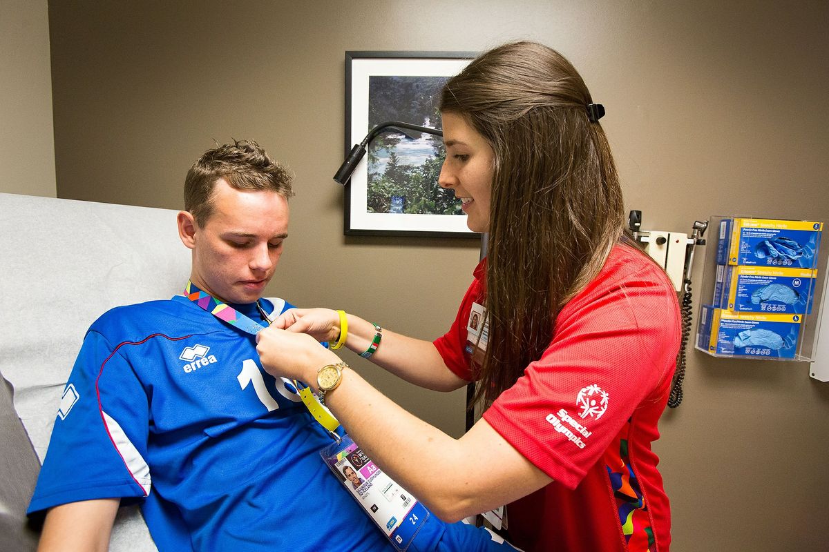 Special Olympics athlete Sigurdur Gudmundsson and Laura McDonough, an administrative fellow with UCLA Health Operations and manager of the polyclinic