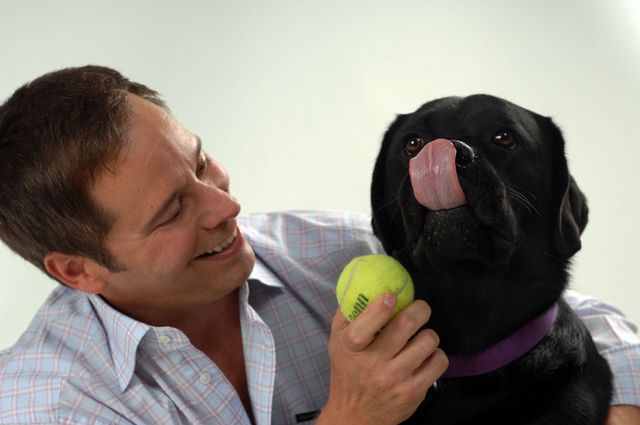 Michael Landa and his Labrador retriever