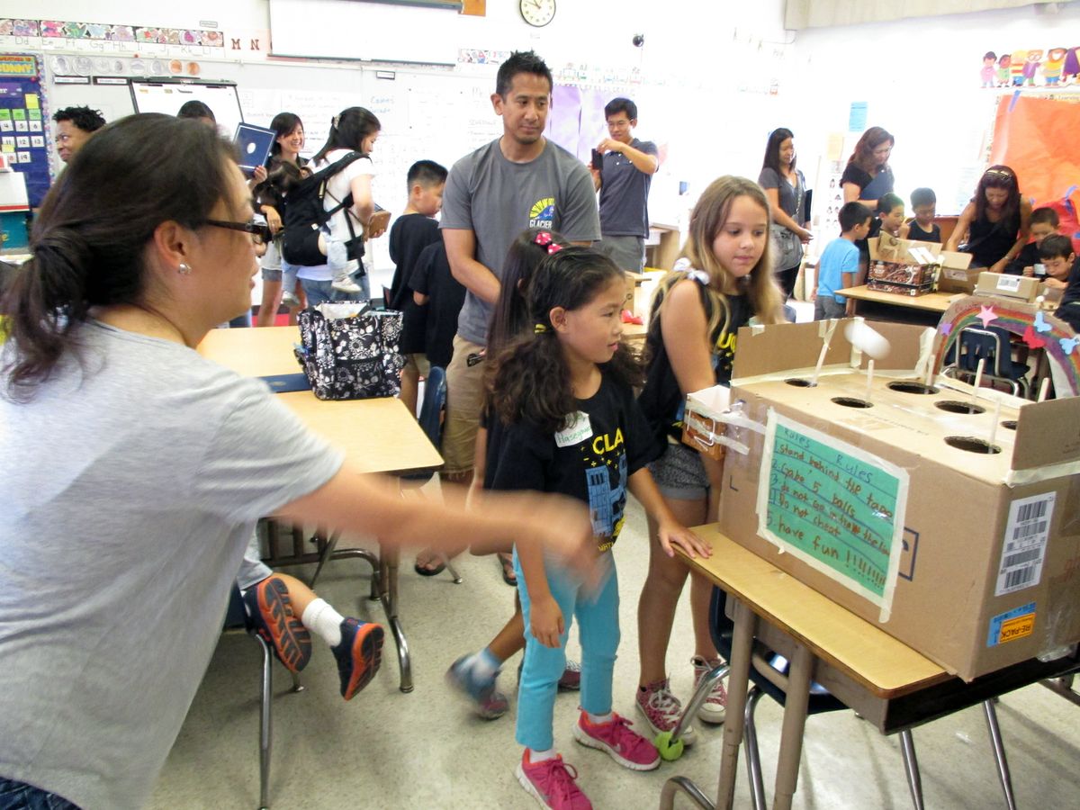 Parents and children at John Adams Elementary School