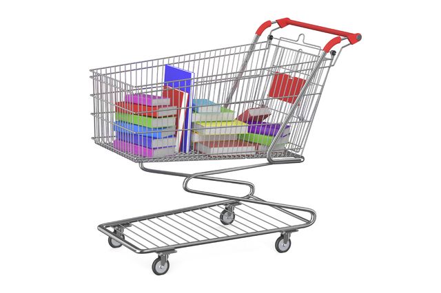 Image of books and course readers in a shopping cart