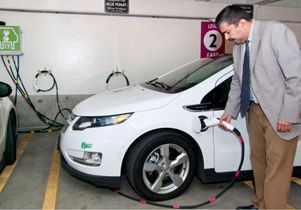 Engineering professor Rajit Gadh fuels an electic car