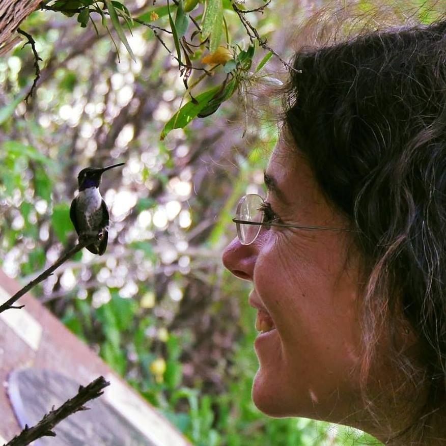 Melanie Barboni and a hummingbird