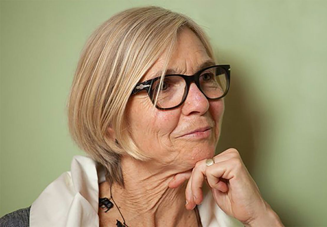 Dana Cuff close-up against light green background