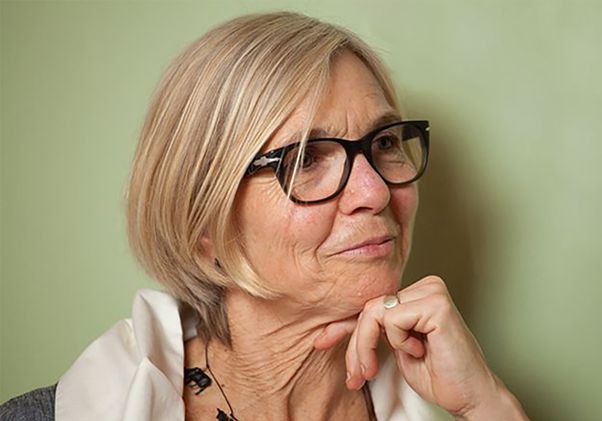 Dana Cuff close-up against light green background