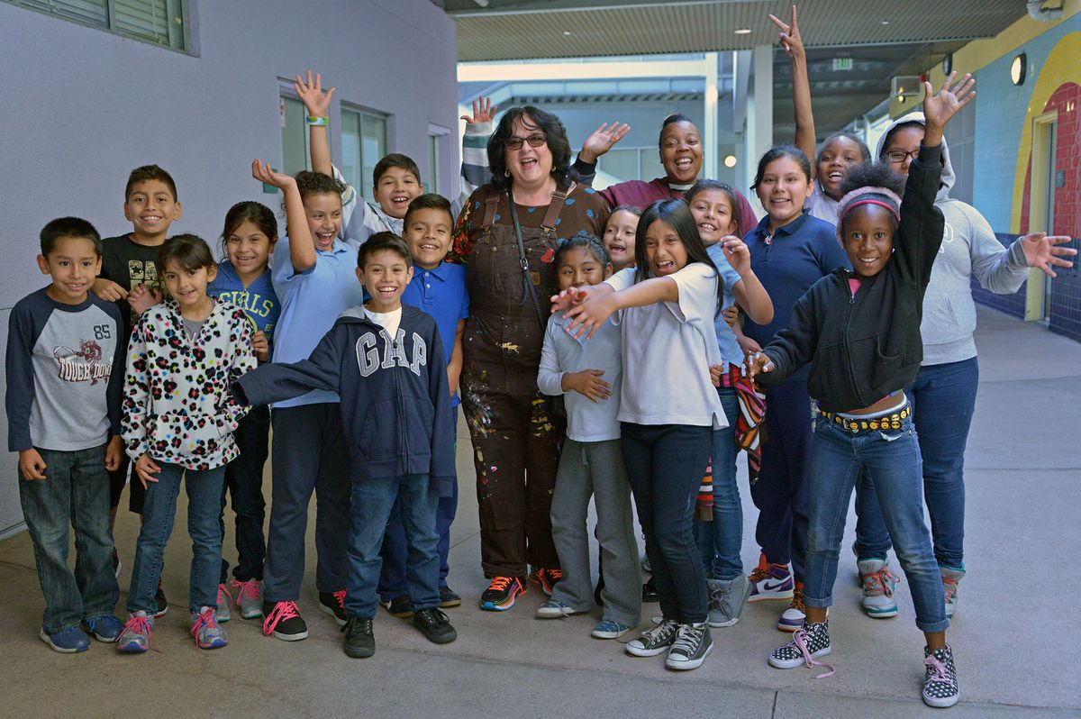 Judy Baca and students