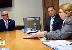 L.A. City Councilman Mitch O'Farrell listens to Stephanie Landregan. 