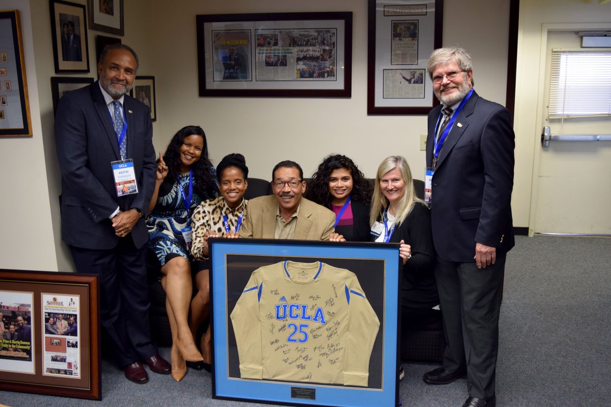 Herb Wesson, center, and visitors from UCLA