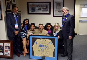 Herb Wesson, center, and visitors from UCLA