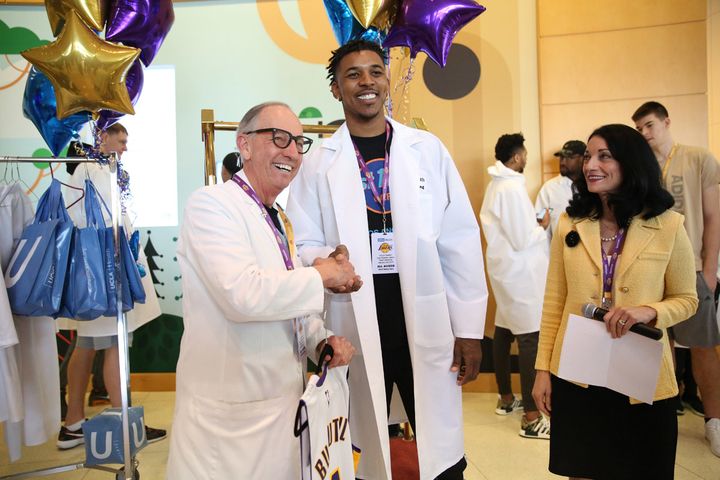 Dr. Ronald Busuttil, Nick Young and Johnese Spisso