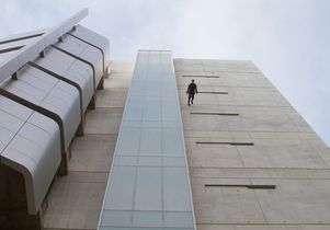 Man walking down Broad Art Center
