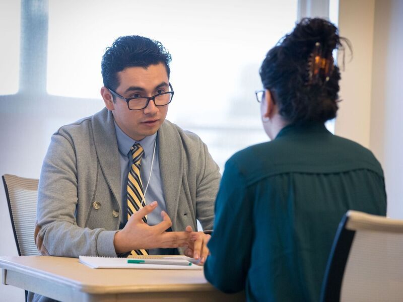 Edgar Corona and a student