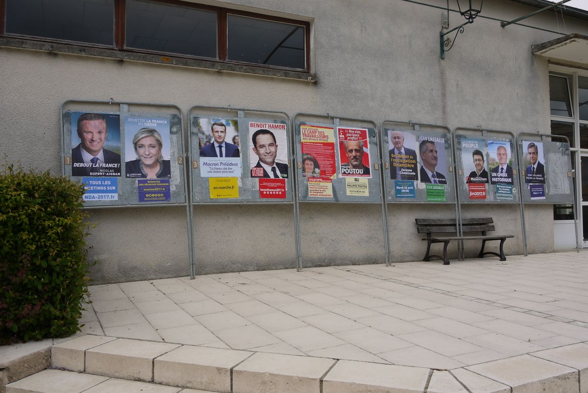 Posters for candidates in the first round of France's presidential election