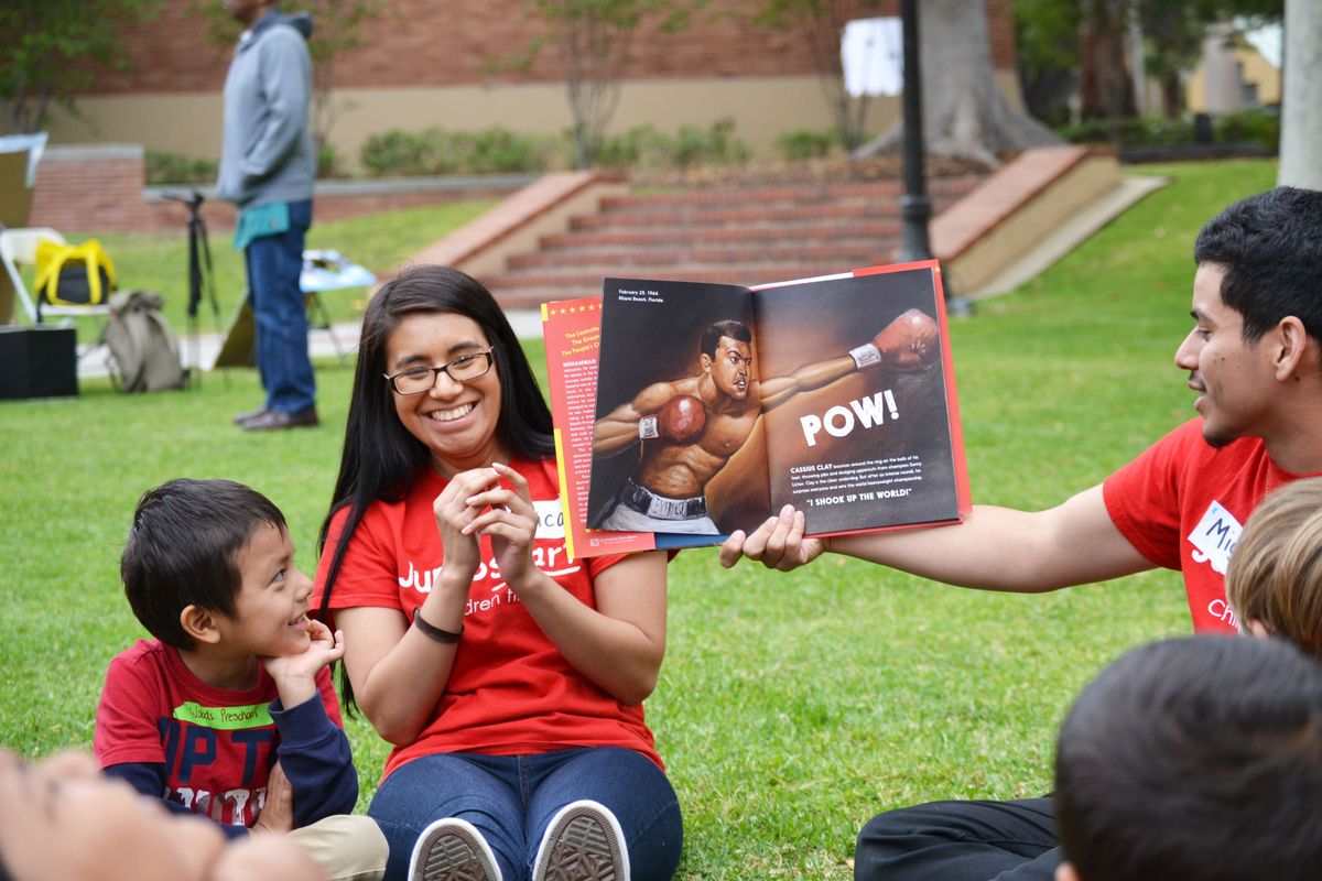 Jumpstart UCLA students and children attending a literacy fair