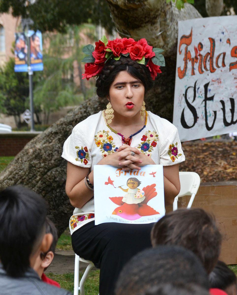 Angelica Castro reads to children