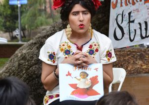 Angelica Castro reads to children
