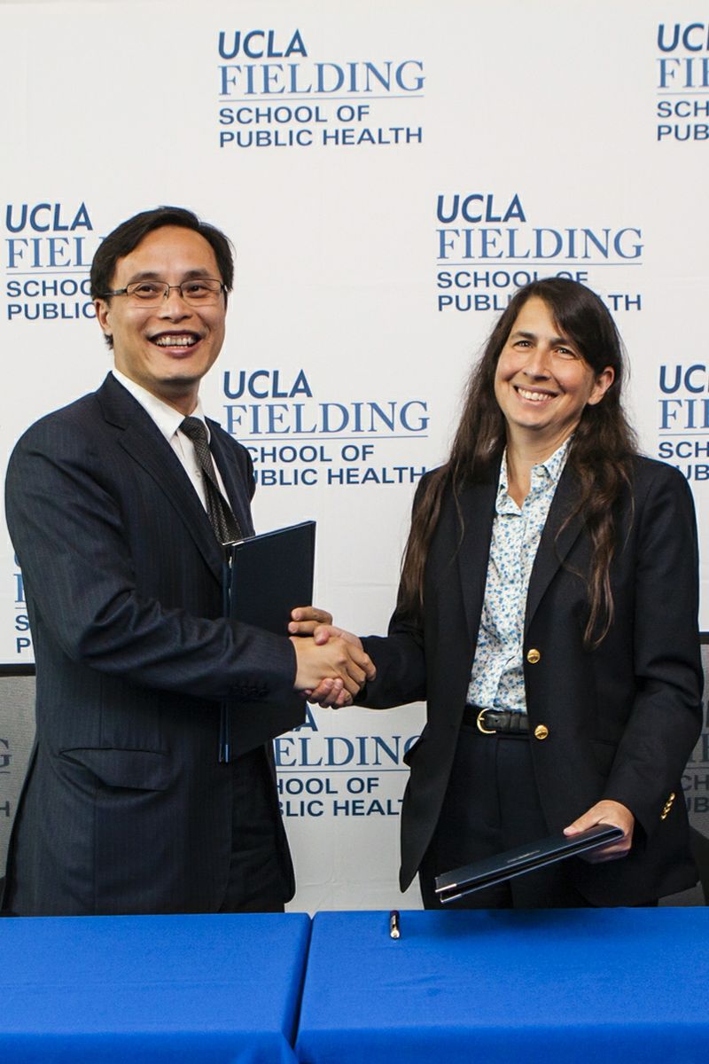Dr. Luqi Huang and Dean Jody Heymann