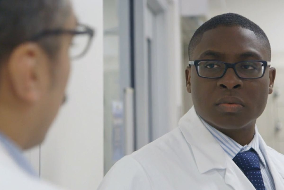 Dr. Amubiyea with colleague