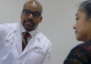 Dr. Frencher with patient