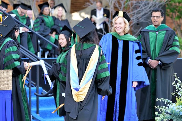 Receiving the diploma