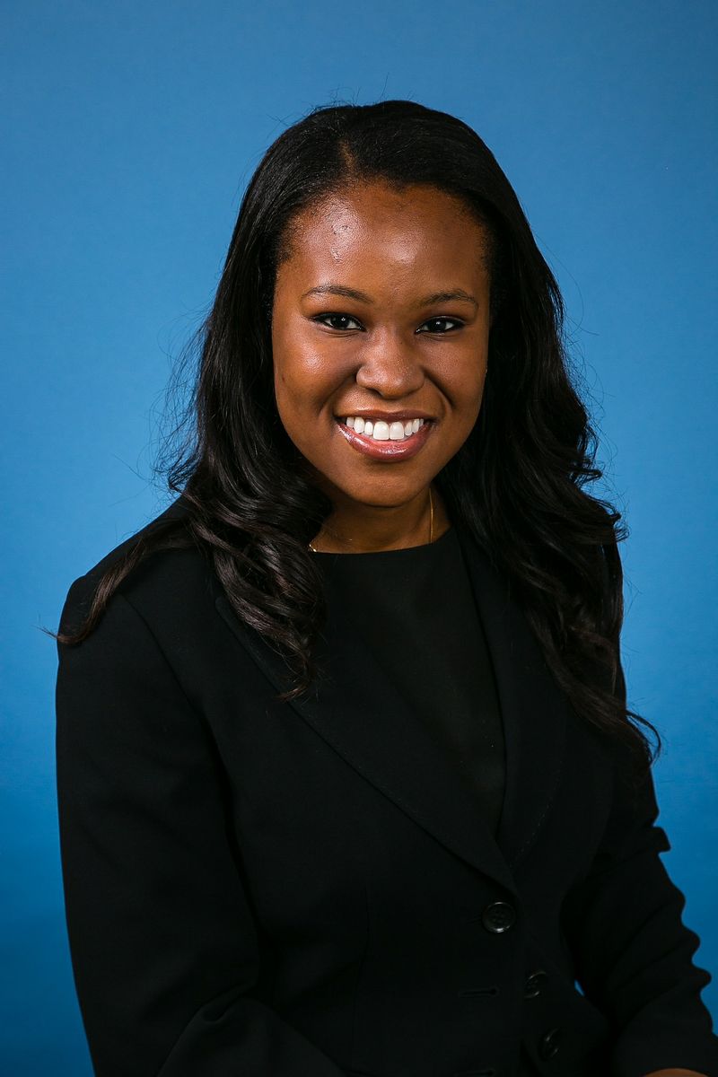 Dr. Fola May
