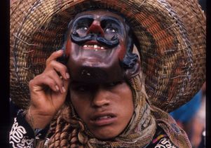 Click to open the large image: Dancer dressed as a Mexican character