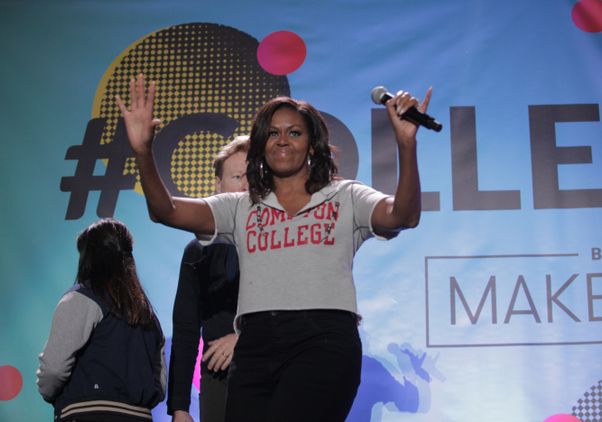 Michelle Obama waves to crowd