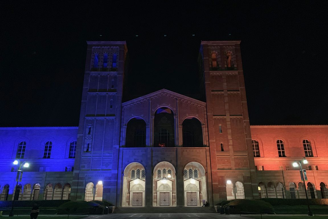 Royce Hall lit in blue