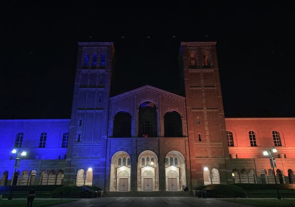 Royce Hall lit in blue