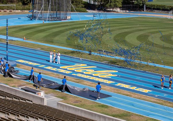 Betsy and Rafer Johnson track