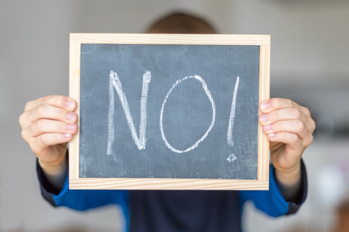 Chalkboard sign saying "No!"