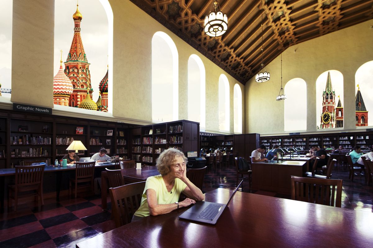 UCLA alumna Elaine Hermann ’53 explores the library’s digital collection at Powell Library. Elaine Hermann ’53