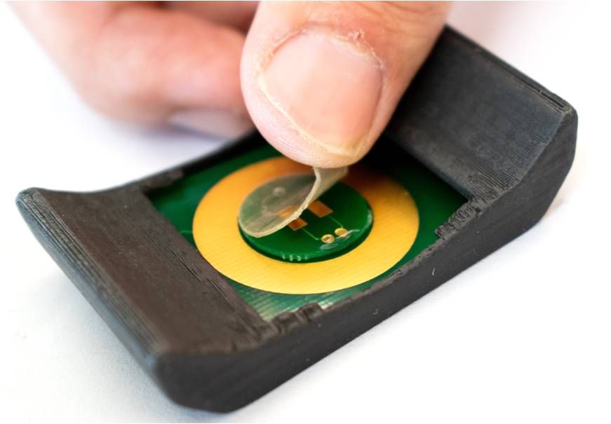 Adhesive film turns smartwatch into biochemical health monitoring