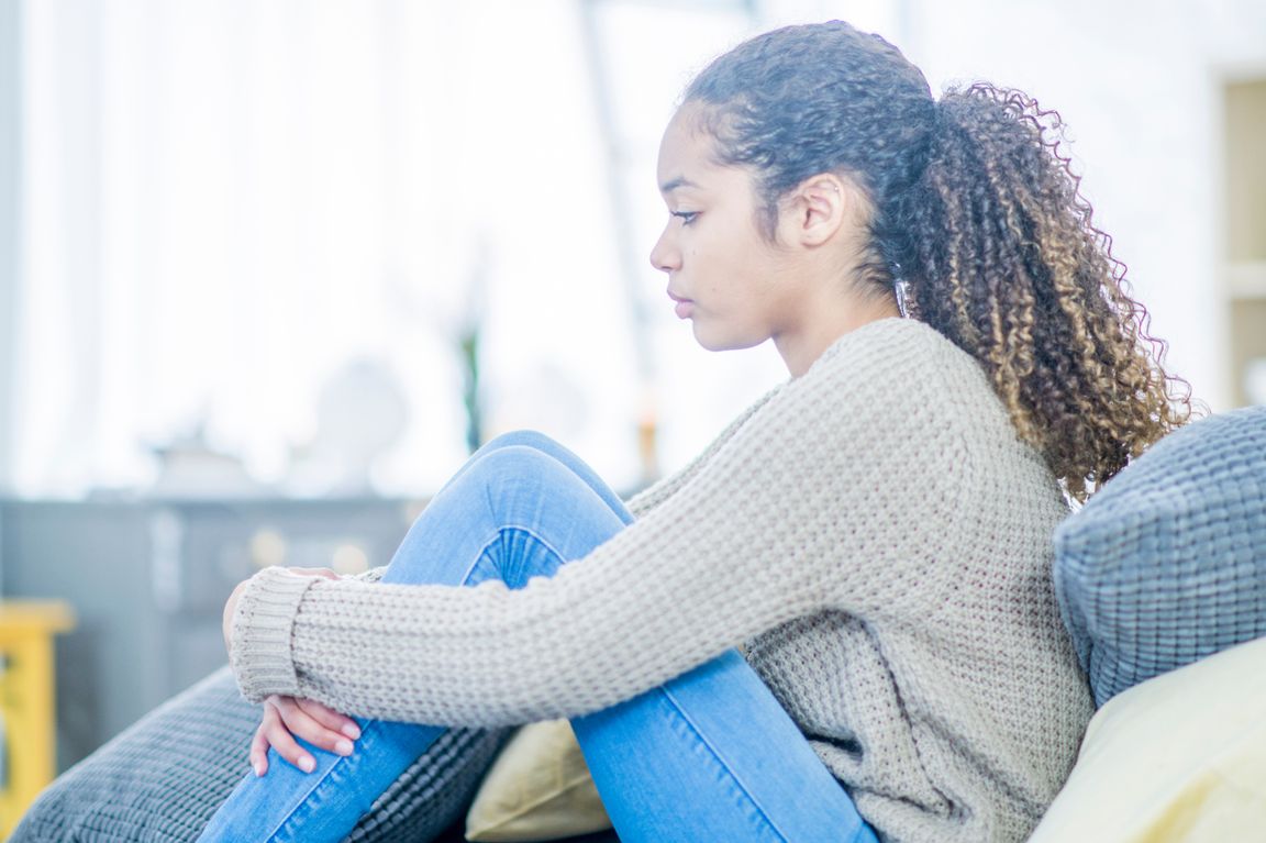 Teen girl sitting