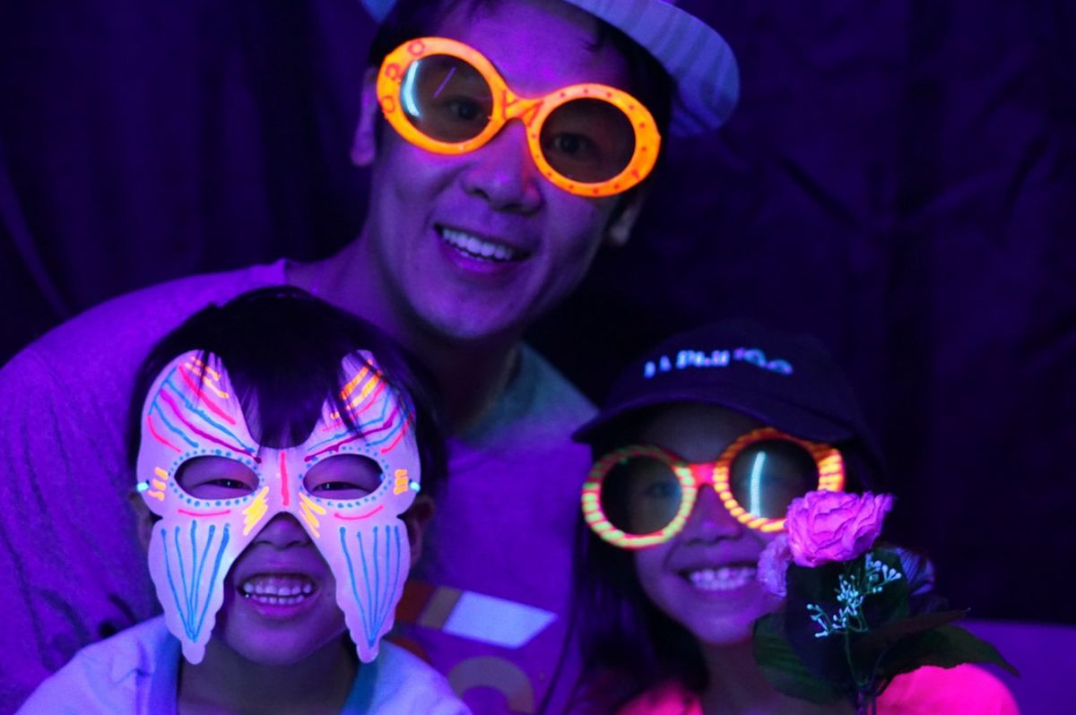 Family in Photonbooth at Exploring Your Universe