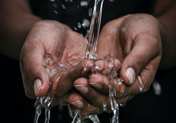 Water pouring into hands